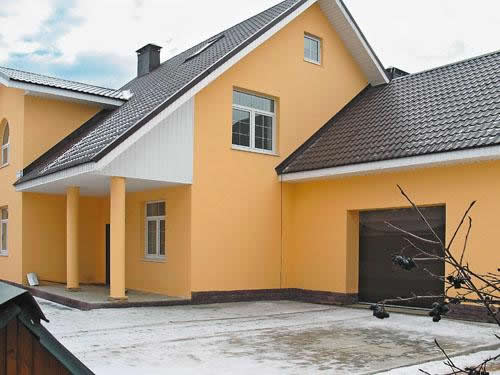 Дом из пеноблока отделанный штукатуркой